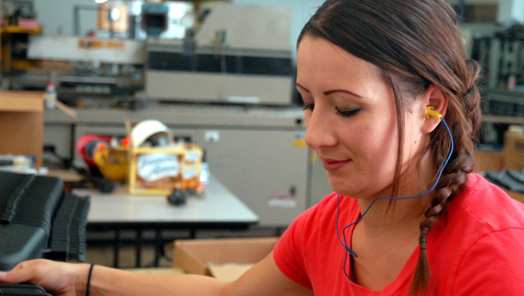 Woman Working Plugfones Earbuds